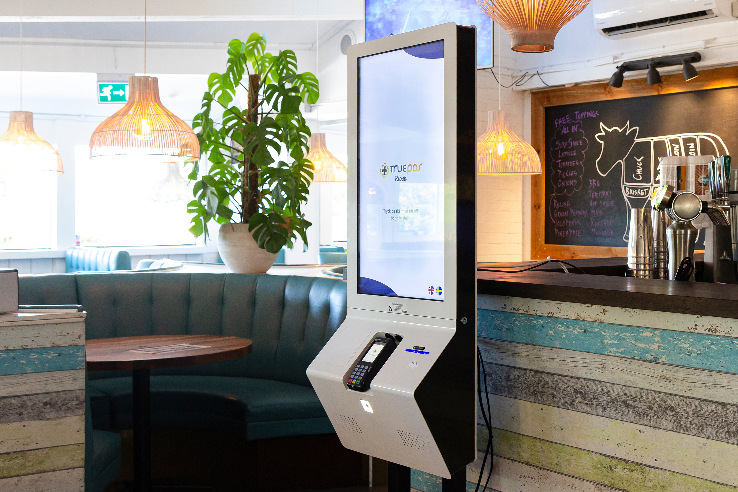 Självservicekiosk i en restaurang frpn TruePOS.